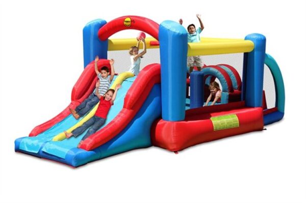 בית מקפיץ מתנפח 9163 מתקן קפיצה להתחרות בכיף - Happy Hop - קפיץ קפיץ מתנפח עם שתי מגלשות. ילדים משחקים, מחליקים וקופצים על משטחים עזים כחולים, אדומים וצהובים בתוך מתחם רשת.